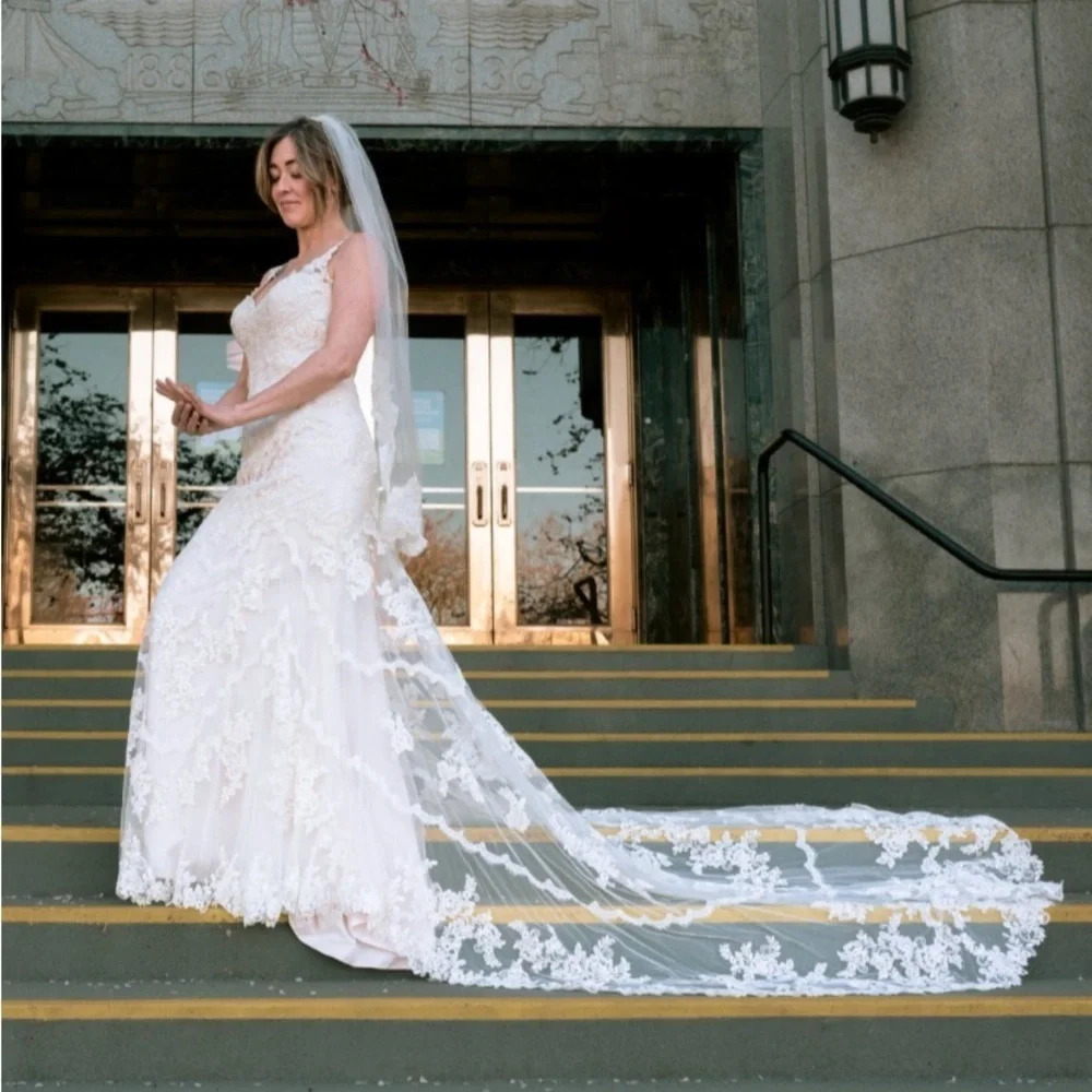 Designer Stella York  antique inspired wedding dress fit and flare lace design